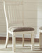 Ashley Bolanburg dining room set with a wooden table and matching chairs, ideal for a modern dining space.