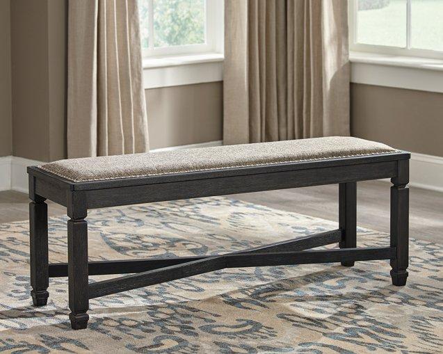 Ashley Furniture Tyler Creek dining set with a wooden table and matching chairs, ideal for stylish dining room arrangements.