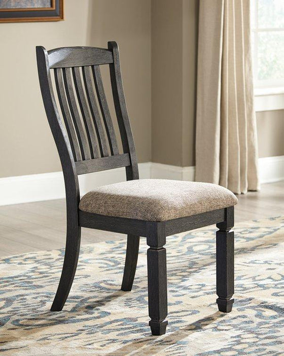 Ashley Furniture Tyler Creek dining room set with a wooden table and matching chairs, perfect for family meals and gatherings.