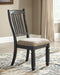 Ashley Furniture Tyler Creek dining room set with a wooden table and matching chairs, perfect for family meals and gatherings.