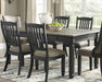 Ashley Furniture Tyler Creek dining room set with a wooden table and matching chairs, perfect for family meals and gatherings.