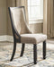 Ashley Tyler Creek dining room set with a wooden table and six matching chairs, ideal for a stylish kitchen or dining area.