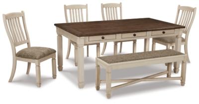 Ashley Bolanburg dining room set with a wooden table and six upholstered chairs, perfect for a modern dining space.
