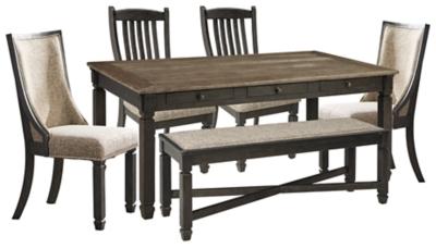 Ashley Furniture Tyler Creek dining room set with a table and chairs, featuring a classic wooden design and elegant finish.