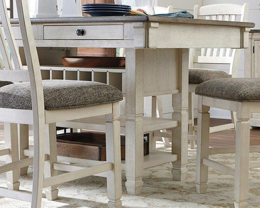 Counter height dining table from Ashley Furniture's Bolanburg collection, shown in a natural wood finish.