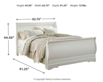 Ashley Furniture Anarasia bed with a wooden frame and upholstered headboard, showcasing elegant bedroom furniture design.