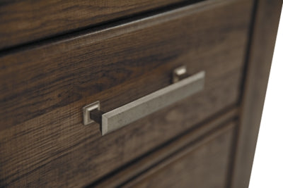 Ashley Furniture Juararo nightstand with a dark wood finish, featuring a single drawer and sleek design for bedroom storage.