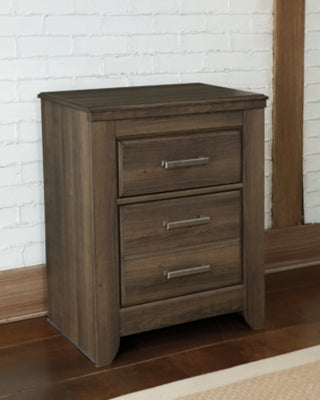 Ashley Furniture Juararo nightstand with a dark wood finish and modern design, featuring a single drawer and open shelf.