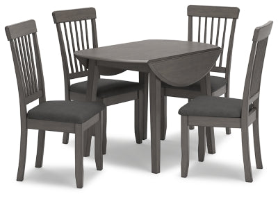 Ashley Furniture Shullden dining room set with a table and matching chairs, showcased in a modern dining space image.