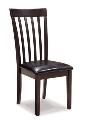 Ashley Furniture Hammis dining chair set featuring four upholstered wooden chairs with a modern design.