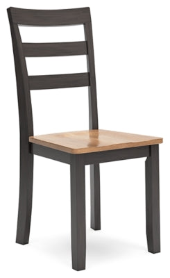 Ashley Furniture Gesthaven dining room set with a wooden table and matching chairs, shown from an angled side view.
