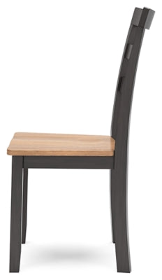 Ashley Furniture Gesthaven dining room set with a table and matching chairs, shown from a side angle in a well-lit dining area.