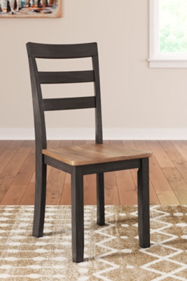 Ashley Furniture Gesthaven dining room set with a wooden table and six matching chairs, featuring a classic design and elegant finish.