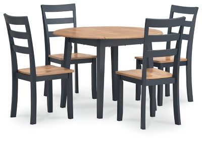 Ashley Furniture Gesthaven dining room set with a wooden table and matching chairs, shown from an angled side view.