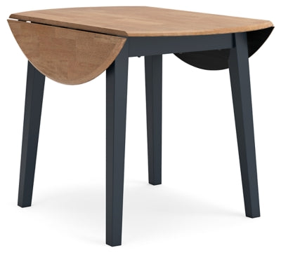 Ashley Furniture Gesthaven dining room set with a wooden table and chairs, shown from a side angle in a well-lit dining room setting.