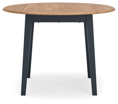 Ashley Furniture Gesthaven dining room set featuring a wooden table with six matching upholstered chairs.