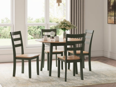 Ashley Furniture Gesthaven dining room set with a wooden table and matching chairs in a warm, inviting dining space.