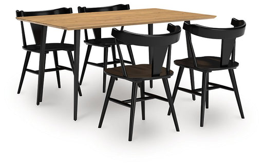 Ashley Furniture Gretlynn dining room set with a wooden table and matching chairs, shown from an angled perspective.