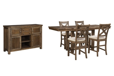 Ashley Furniture Moriville counter height dining set with four chairs and a rectangular table in a stylish dining room setting.