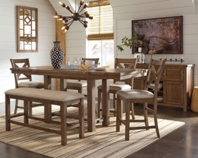 Ashley Furniture Moriville counter height dining set with a wooden table and matching chairs in a modern dining room setting.