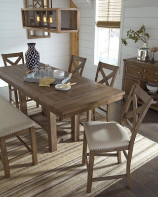 Ashley Furniture Moriville counter height dining set with a wood table and four matching chairs in a modern dining room.