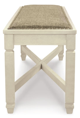 Ashley Furniture Bolanburg dining room set with a table and chairs, featuring a warm wood finish and classic design.