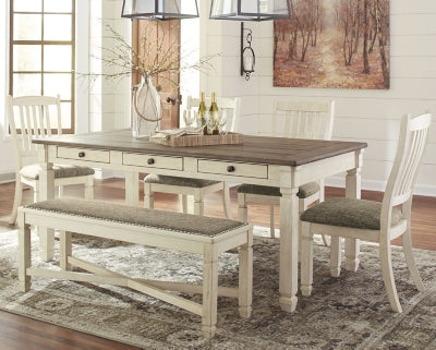 Ashley Furniture Bolanburg dining room set with a wooden table and matching chairs, shown in a modern dining room setting.