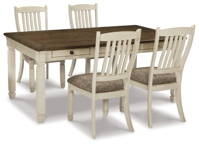 Ashley Furniture Bolanburg dining room set featuring a rectangular table and matching chairs in a warm wood finish.