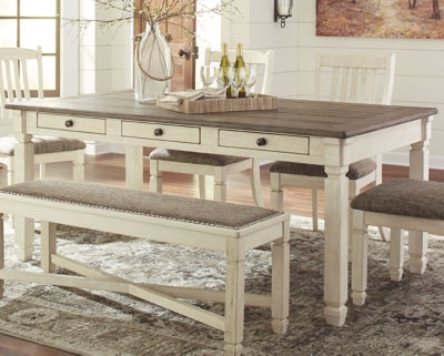Ashley Furniture Bolanburg dining table with a sleek wooden surface and sturdy legs, perfect for modern dining rooms.