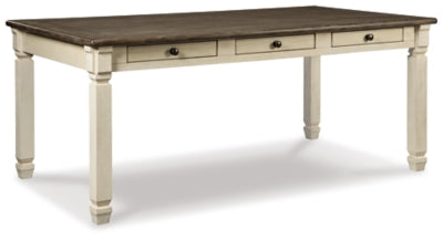 Ashley Furniture Bolanburg dining table with a dark wood finish, shown in a spacious dining room setting.