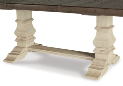 Ashley Furniture Bolanburg dining room set with a wooden table and matching chairs, detailed view of the table surface.