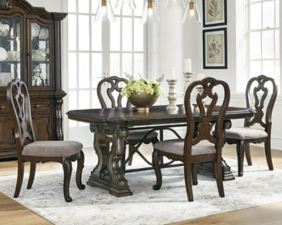 Ashley Furniture Maylee dining room set featuring a table with four chairs in a modern wood finish.