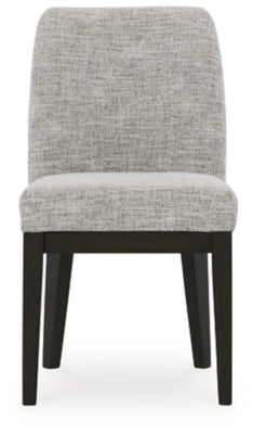 Ashley Furniture Burkhaus dining room set with a table and matching chairs, shown from a head-on view in a modern dining space.