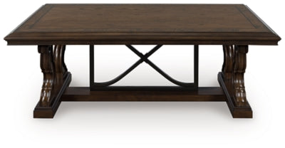 Ashley Furniture Maylee coffee table with a sleek, modern cocktail table design featuring a smooth wooden surface.