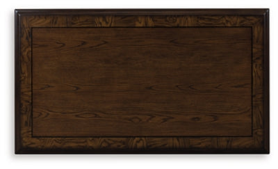 Ashley Furniture Maylee coffee table with a sleek rectangular wooden top and modern metal legs, ideal for living room decor.