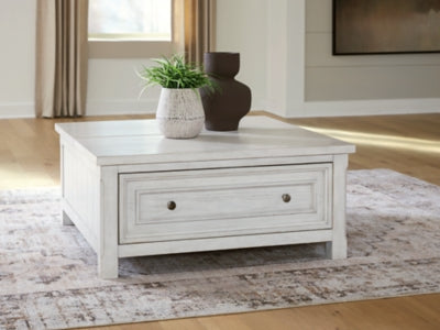 Ashley Furniture Robbinsdale lift-top cocktail coffee table with closed top and storage, shown in a cropped image.