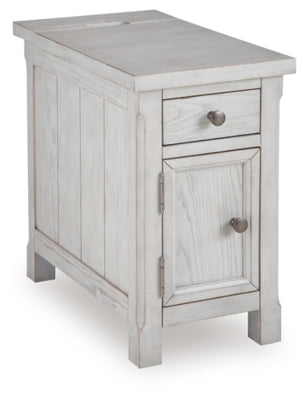 Ashley Furniture Robbinsdale chairside end table shown from an angled view, featuring a wooden surface and storage drawer.