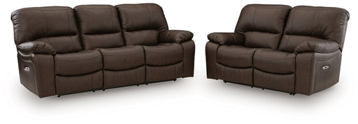 Ashley Furniture Leesworth living room set with a sofa and loveseat, featuring plush cushions and neutral fabric upholstery.